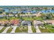 Aerial view of a single-Gathering home in a residential neighborhood at 2341 Rio De Janeiro Ave, Punta Gorda, FL 33983