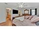 Main bedroom with large TV and ensuite bathroom at 2341 Rio De Janeiro Ave, Punta Gorda, FL 33983