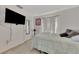 Bedroom with full-size bed and wall-mounted TV at 2341 Rio De Janeiro Ave, Punta Gorda, FL 33983