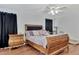Serene bedroom with a sleigh bed and wood nightstand at 2341 Rio De Janeiro Ave, Punta Gorda, FL 33983