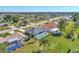 Aerial view of a house with a pool in a residential neighborhood at 2341 Rio De Janeiro Ave, Punta Gorda, FL 33983