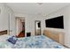 Bedroom with a queen bed and access to hallway at 2341 Rio De Janeiro Ave, Punta Gorda, FL 33983