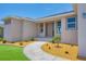 New construction home with a two-car garage and lush lawn at 8343 Olsen St, Port Charlotte, FL 33981