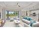 Bright living room features sliding glass doors leading to backyard, and an open floorplan at 8343 Olsen St, Port Charlotte, FL 33981