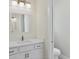 Bathroom with toilet and modern vanity at 8343 Olsen St, Port Charlotte, FL 33981