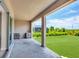 Covered patio with outdoor kitchen and backyard view at 8343 Olsen St, Port Charlotte, FL 33981