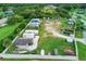 Aerial view of RV lot with storage shed and boats at 584 Gadsen St, Englewood, FL 34223