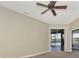 Bedroom with water view and sliding glass doors at 584 Gadsen St, Englewood, FL 34223