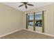 Bright bedroom with carpet and a lake view at 584 Gadsen St, Englewood, FL 34223