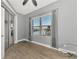 Bright bedroom with wood-look floors and water view at 584 Gadsen St, Englewood, FL 34223