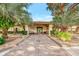 Attractive community entrance with landscaping and benches at 584 Gadsen St, Englewood, FL 34223