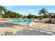 Refreshing community pool with lounge chairs at 584 Gadsen St, Englewood, FL 34223