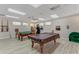 Community game room with pool tables at 584 Gadsen St, Englewood, FL 34223