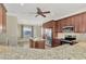 Modern kitchen featuring granite countertops and island at 584 Gadsen St, Englewood, FL 34223