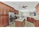 Modern kitchen with stainless steel appliances and granite island at 584 Gadsen St, Englewood, FL 34223