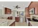 Kitchen with stainless steel appliances and granite countertops at 584 Gadsen St, Englewood, FL 34223