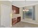 Eat-in kitchen with ample cabinetry and granite countertops at 584 Gadsen St, Englewood, FL 34223