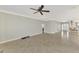 Spacious living room with tile floors and ceiling fan at 584 Gadsen St, Englewood, FL 34223