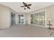 Screened porch with access to other rooms and lake view at 584 Gadsen St, Englewood, FL 34223