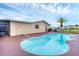 Inviting kidney-shaped pool with ample deck space at 76 Caddy Rd, Rotonda West, FL 33947
