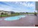 Refreshing kidney-shaped pool with canal views at 76 Caddy Rd, Rotonda West, FL 33947