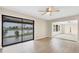 Dining room with water view and access to the patio at 76 Caddy Rd, Rotonda West, FL 33947