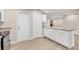 Modern kitchen with an island and stainless steel appliances at 76 Caddy Rd, Rotonda West, FL 33947