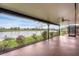 Large screened patio with water views at 76 Caddy Rd, Rotonda West, FL 33947