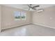 Spacious bedroom with tile flooring and water view at 76 Caddy Rd, Rotonda West, FL 33947