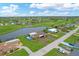 Property features a pool and is situated near a golf course and lake at 76 Caddy Rd, Rotonda West, FL 33947
