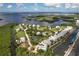 Aerial view of community with waterfront access and lush landscaping at 13330 Anglers Way, Placida, FL 33946