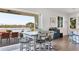 Casual breakfast nook with metal table and chairs, water views at 13330 Anglers Way, Placida, FL 33946