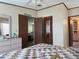 Bedroom with double door closet and bath access at 8485 Nighthawk Dr, Englewood, FL 34224