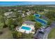 Resort-style community pool with tennis courts nearby at 4260 Placida Rd # 9B, Englewood, FL 34224