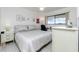 Cozy bedroom with a queen-size bed, and built-in workspace at 4260 Placida Rd # 9B, Englewood, FL 34224