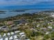 Aerial view showcasing a condo building near a body of water at 4260 Placida Rd # 9B, Englewood, FL 34224