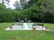 Enjoy recreational shuffleboard court with benches at 4260 Placida Rd # 9B, Englewood, FL 34224
