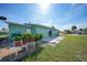 Backyard with patio and lush landscaping at 13478 Santa Rosa Ave, Port Charlotte, FL 33981