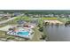 Community pool with tennis courts and clubhouse at 13478 Santa Rosa Ave, Port Charlotte, FL 33981