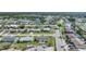 Aerial view of a single-Gathering home and surrounding neighborhood at 13478 Santa Rosa Ave, Port Charlotte, FL 33981