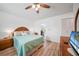 Main bedroom with king bed and access to exterior at 13478 Santa Rosa Ave, Port Charlotte, FL 33981