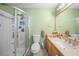 Updated bathroom with a walk-in shower and double vanity at 13478 Santa Rosa Ave, Port Charlotte, FL 33981
