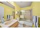 Bathroom with tub/shower combo and updated vanity at 13478 Santa Rosa Ave, Port Charlotte, FL 33981