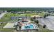 Community pool with surrounding deck and lounge area at 13478 Santa Rosa Ave, Port Charlotte, FL 33981