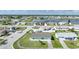 Aerial view of a single-Gathering home and surrounding neighborhood at 13478 Santa Rosa Ave, Port Charlotte, FL 33981