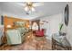 Living room with tiled floors, comfortable seating, and coastal decor at 13478 Santa Rosa Ave, Port Charlotte, FL 33981
