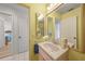 Bright bathroom with vanity, sink, and shower at 13478 Santa Rosa Ave, Port Charlotte, FL 33981