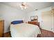 Full-size bedroom with wood floors and ample closet space at 13478 Santa Rosa Ave, Port Charlotte, FL 33981