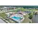 Community pool with tennis courts and clubhouse at 13478 Santa Rosa Ave, Port Charlotte, FL 33981