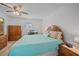 Large bedroom with a king-size bed, dresser, and plenty of closet space at 13478 Santa Rosa Ave, Port Charlotte, FL 33981